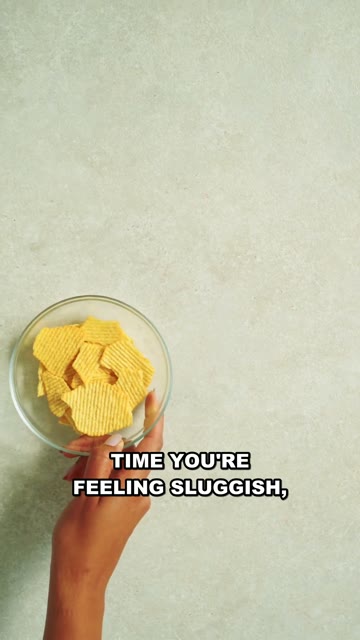A bowl of healthy snacks held in two hands